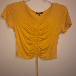 Yellow tie knot v neck shirt